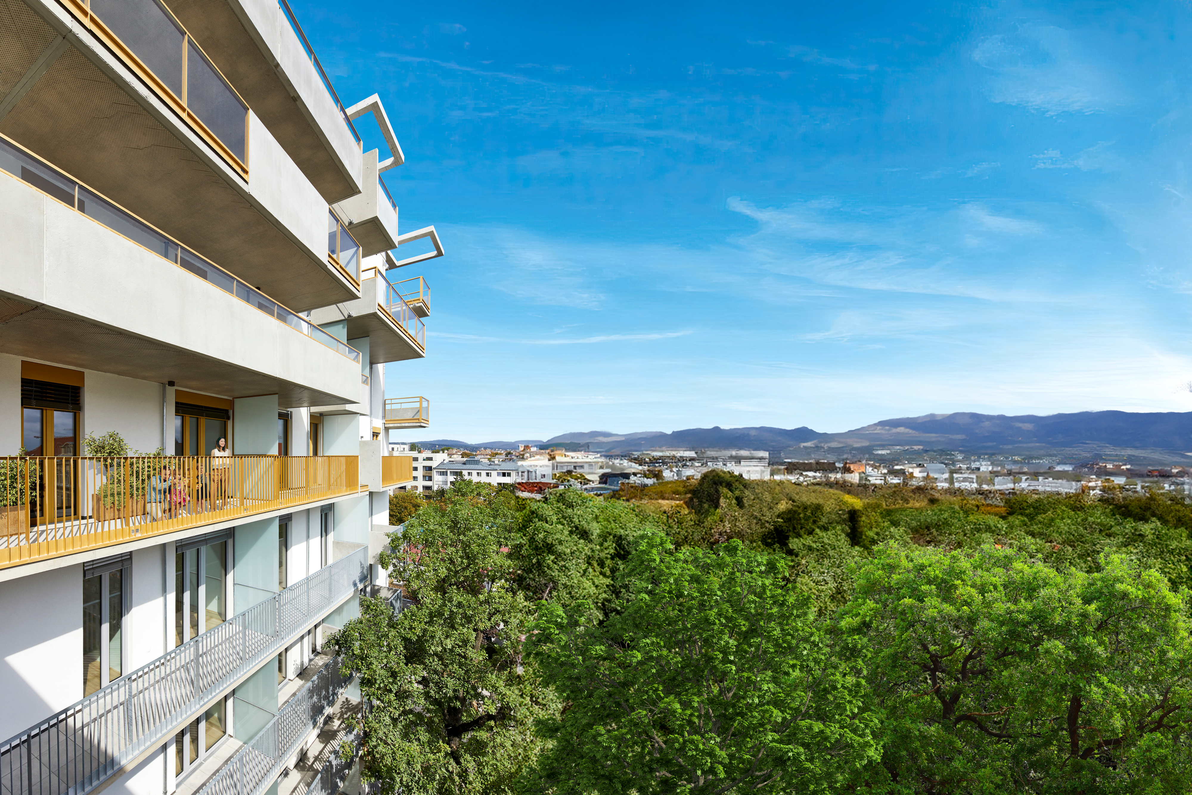 Außenansicht mit blauem Himmel auf die Hausfront der Spallartgasse in 1140 WIien